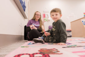 Staff member with young patient